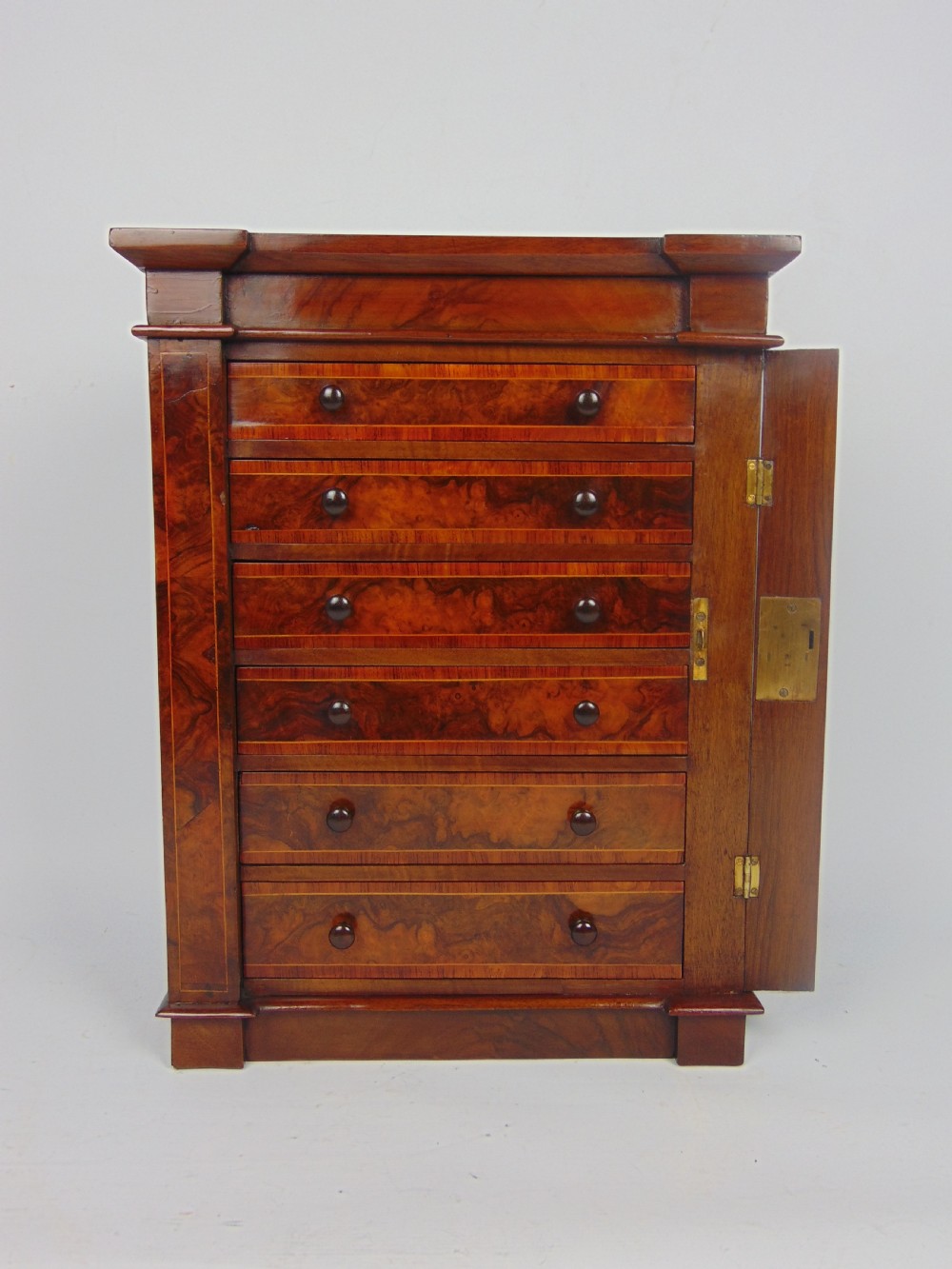 A rare walnut miniature collectors wellington chest  View III