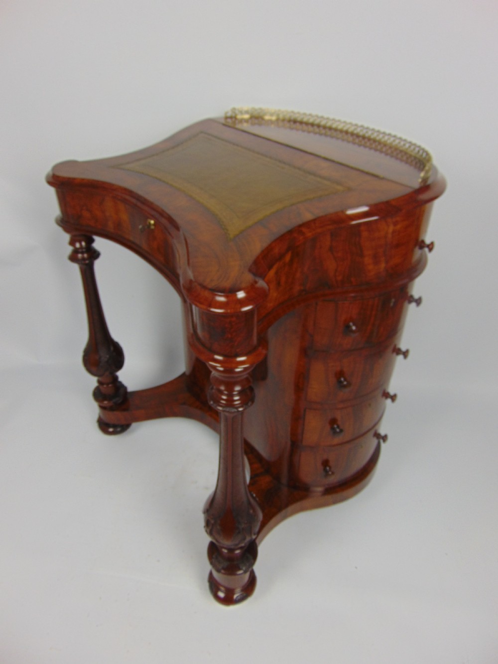 A exceptional Victorian walnut davenport desk View III