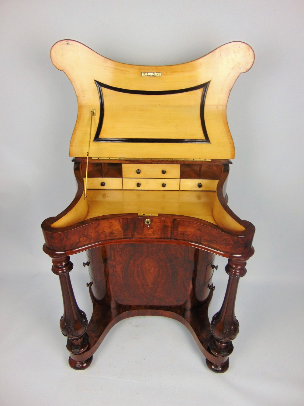 A exceptional Victorian walnut davenport desk View VI