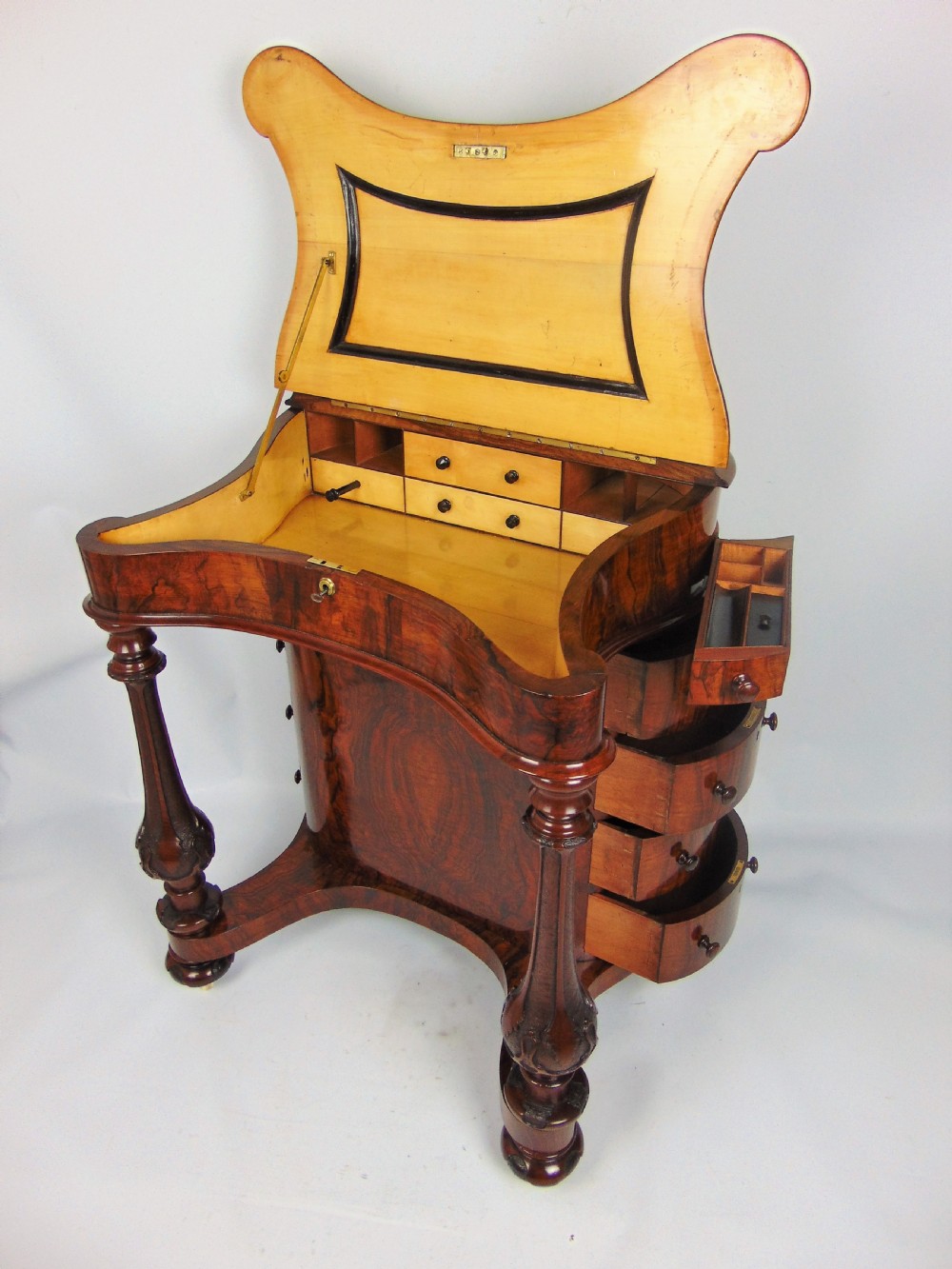A exceptional Victorian walnut davenport desk View VII