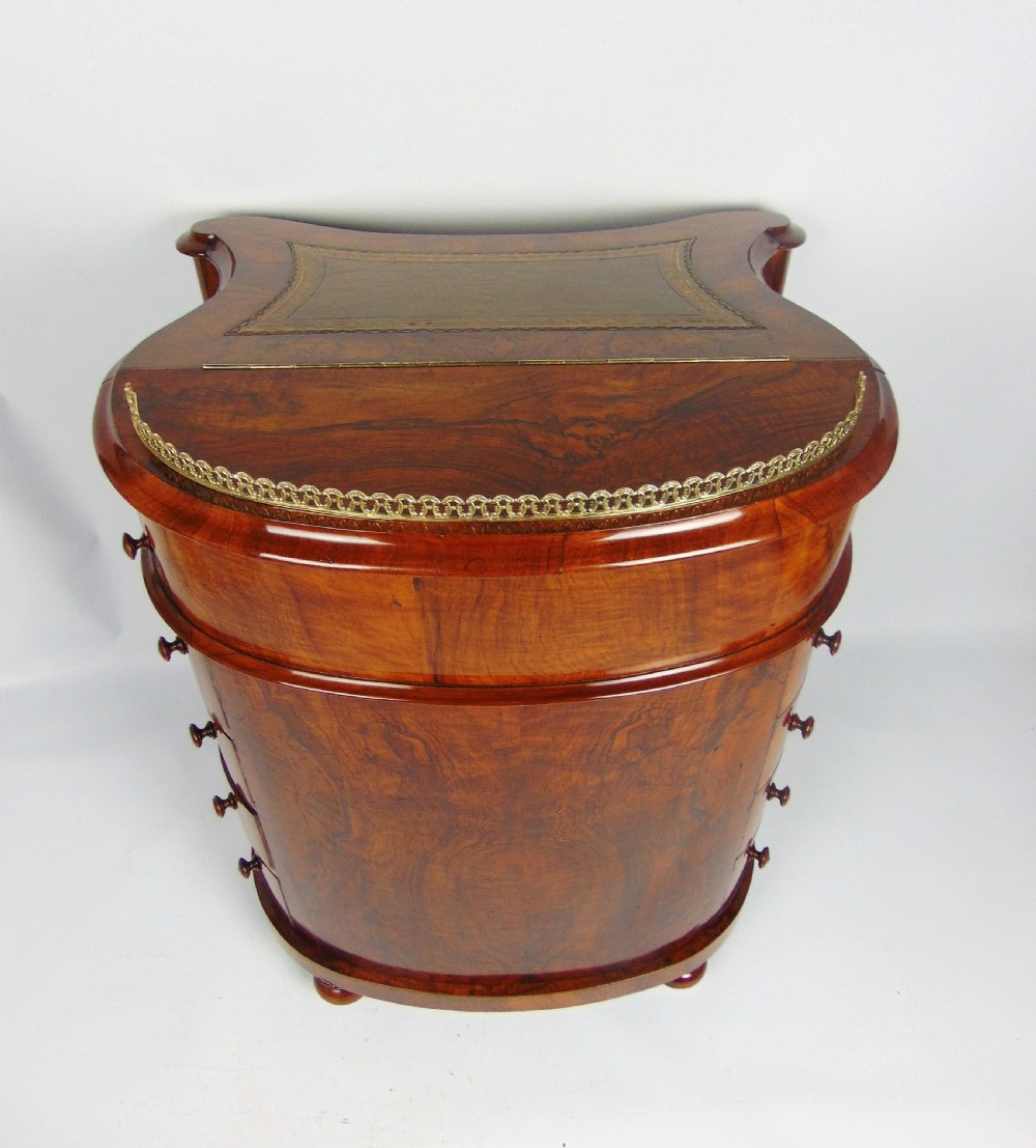 A exceptional Victorian walnut davenport desk View VIII