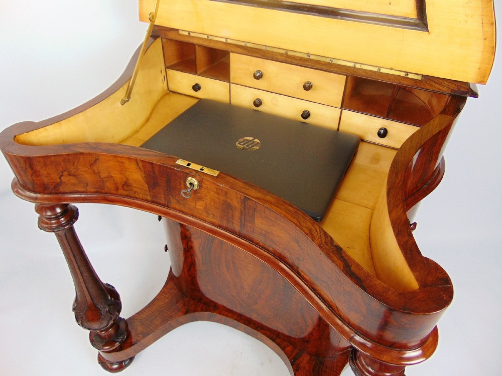 A exceptional Victorian walnut davenport desk View X