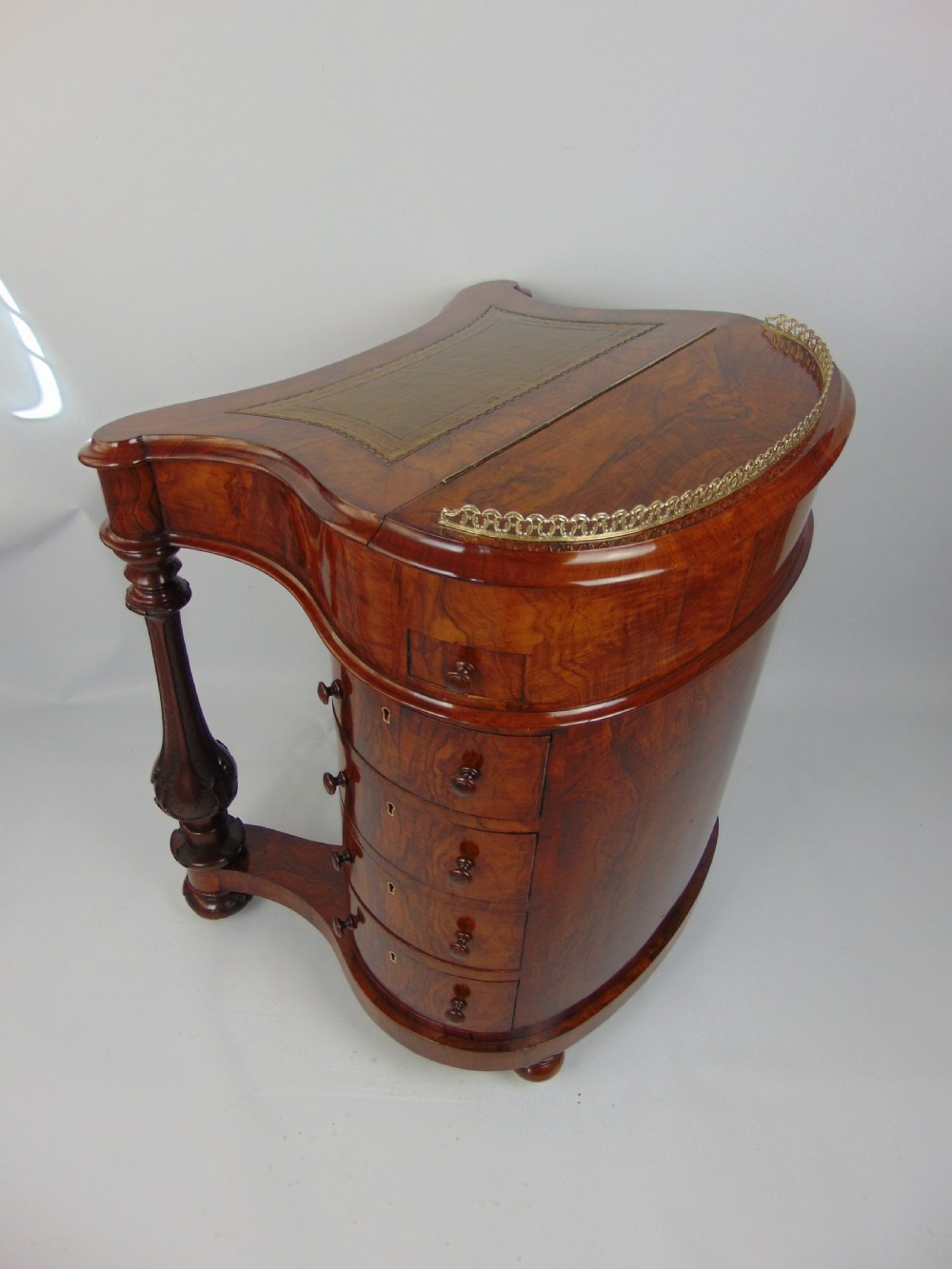 A exceptional Victorian walnut davenport desk View XI