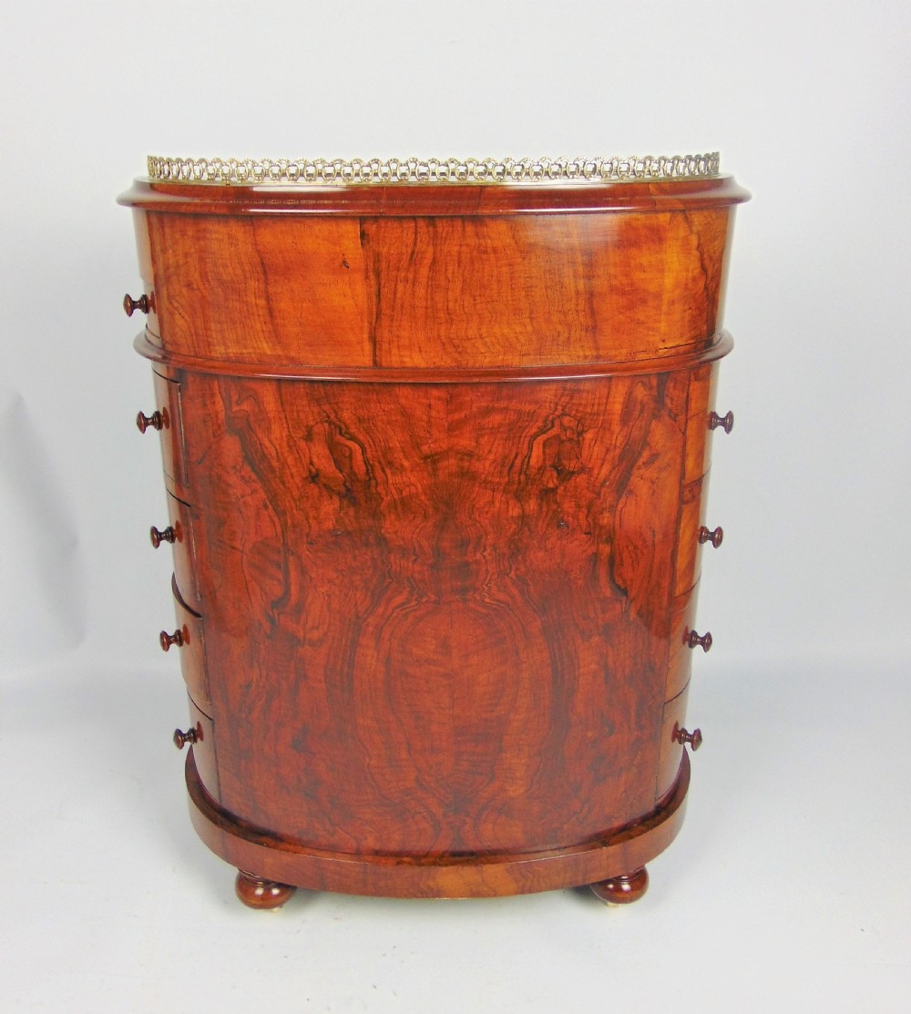 A exceptional Victorian walnut davenport desk View XIII