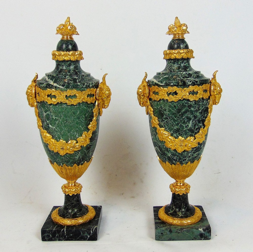 A most elegant pair of marble cassolette 