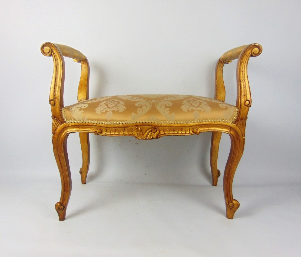 A pretty giltwood window seat View IV