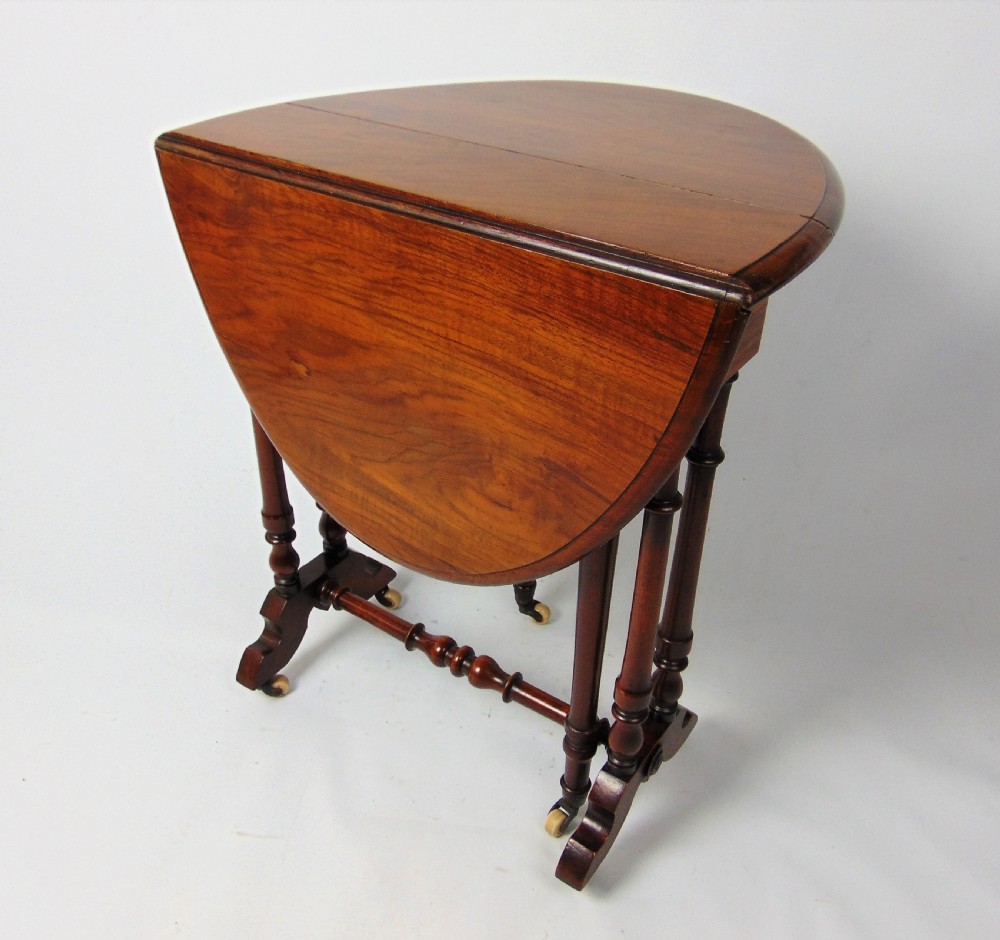 A small Walnut Sutherland table 