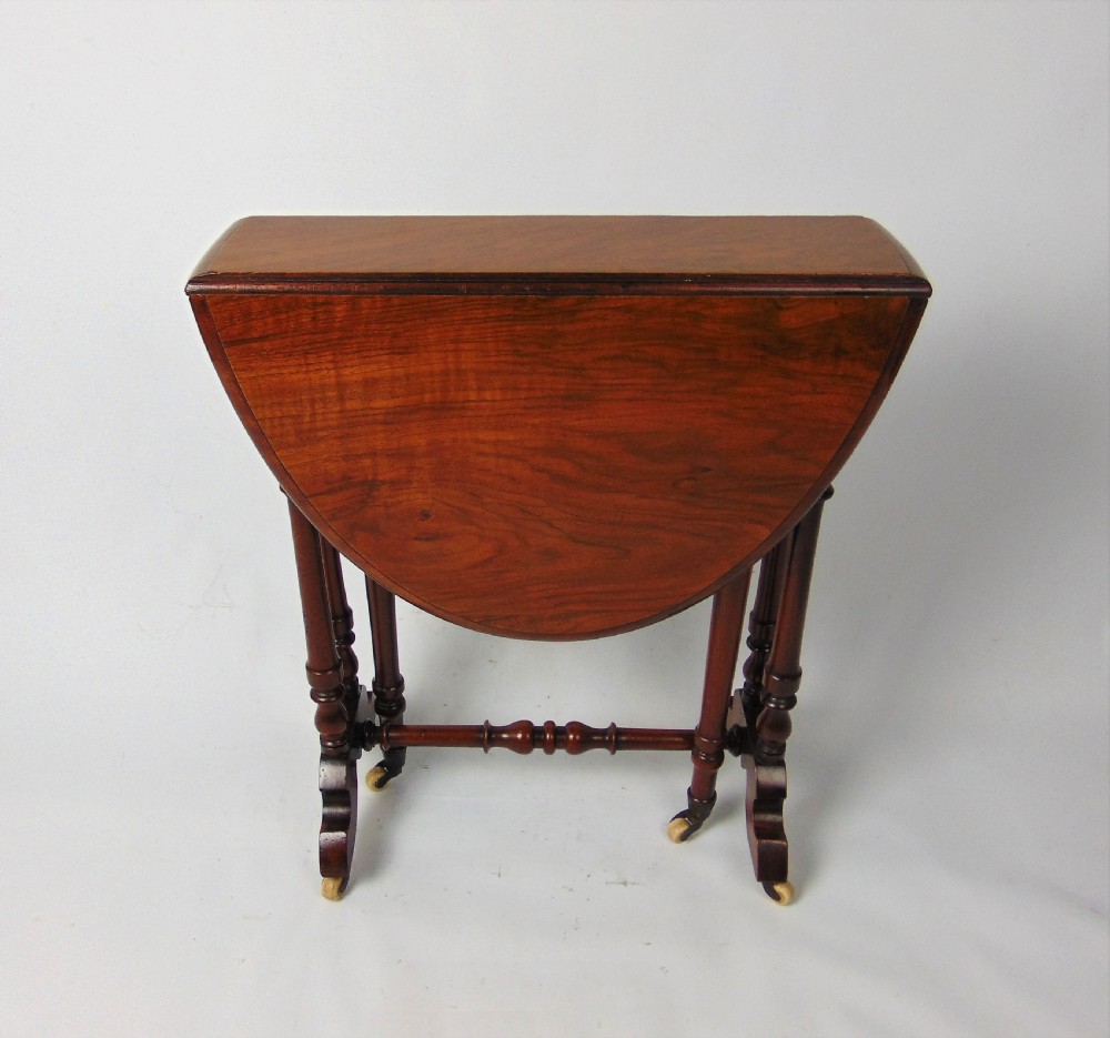 A small Walnut Sutherland table  View II