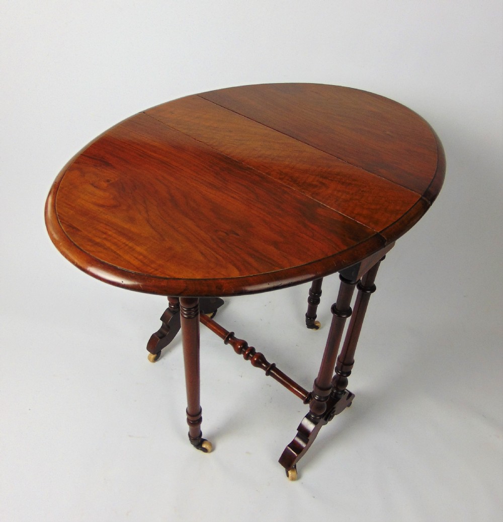 A small Walnut Sutherland table  View III