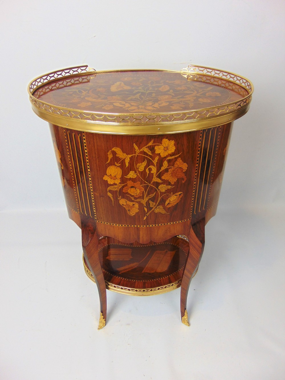 A superb marquetry oval side table  View III