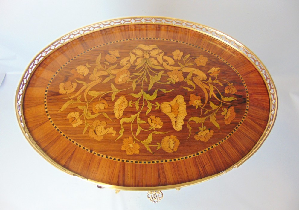 A superb marquetry oval side table  View IV
