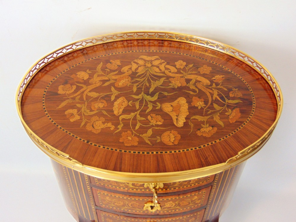 A superb marquetry oval side table  View V