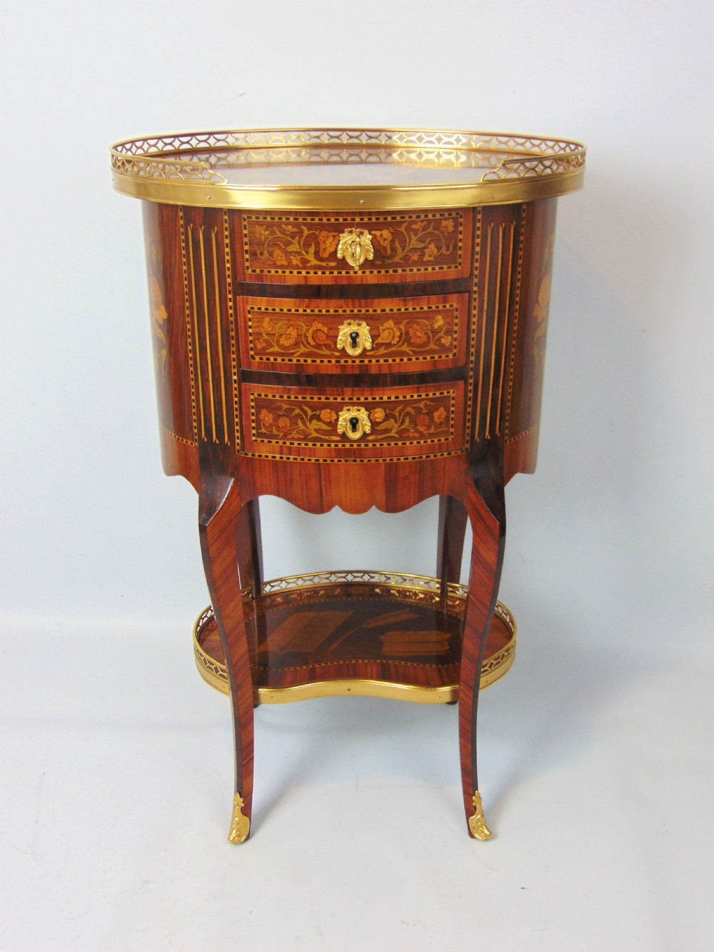 A superb marquetry oval side table  View VII