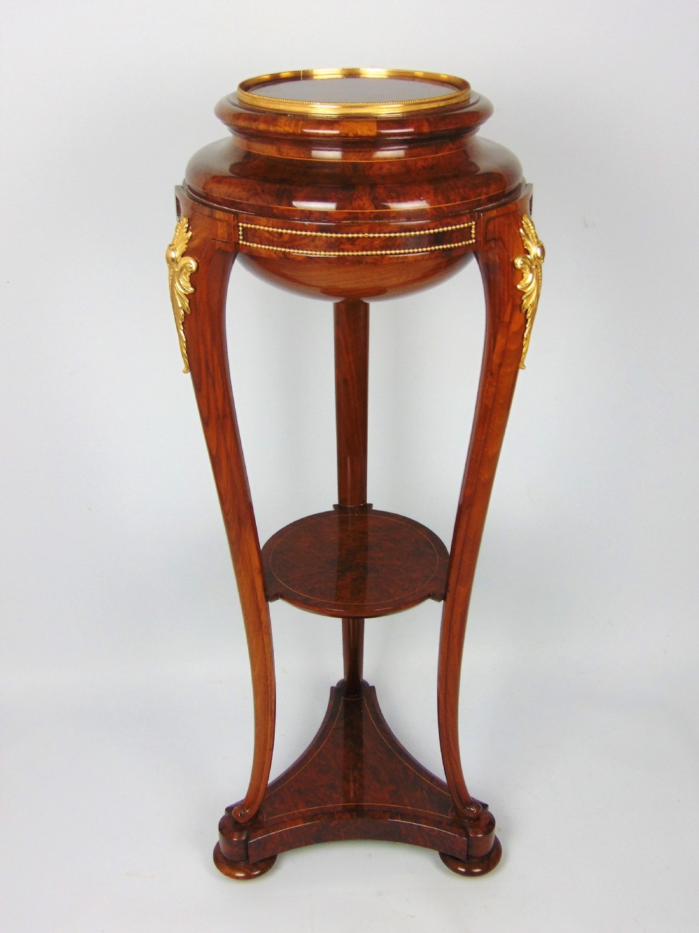 A most elegant Burr Walnut torchere jardinere 