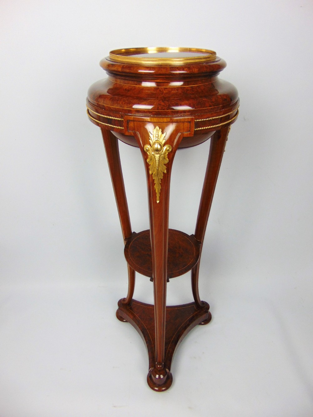A most elegant Burr Walnut torchere jardinere  View II