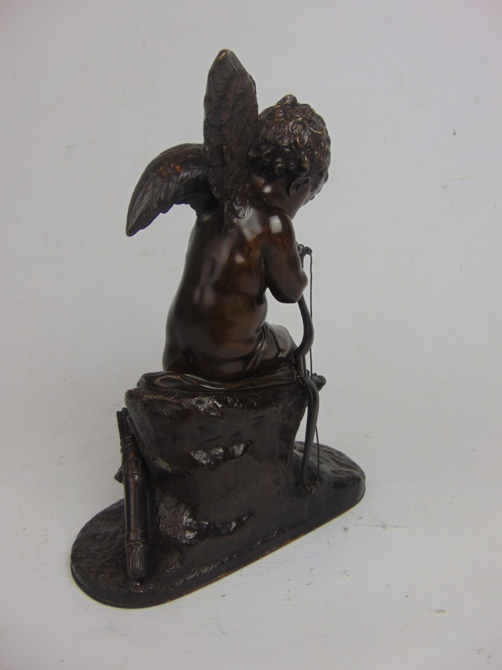 A Bronze Cupid stringing his bow  View V