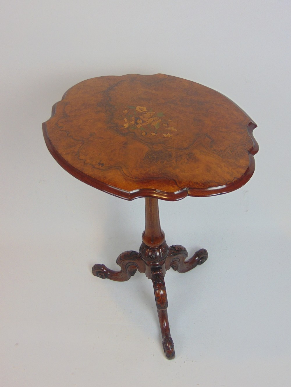 A pretty walnut occasional table 