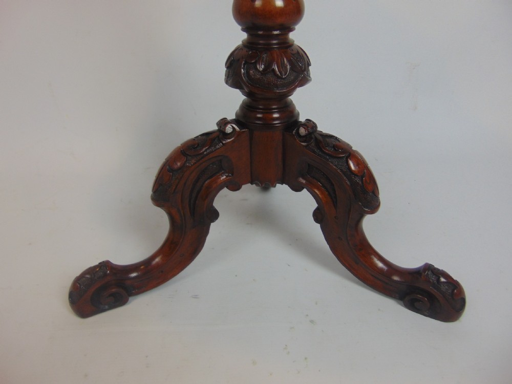 A pretty walnut occasional table  View IV