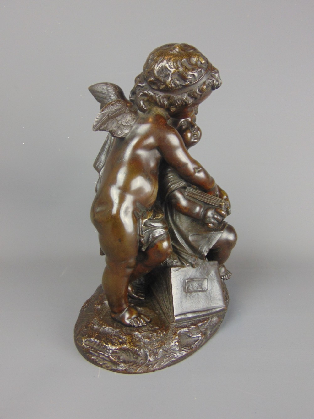 A fine Bronze of a Cherub and girl View II