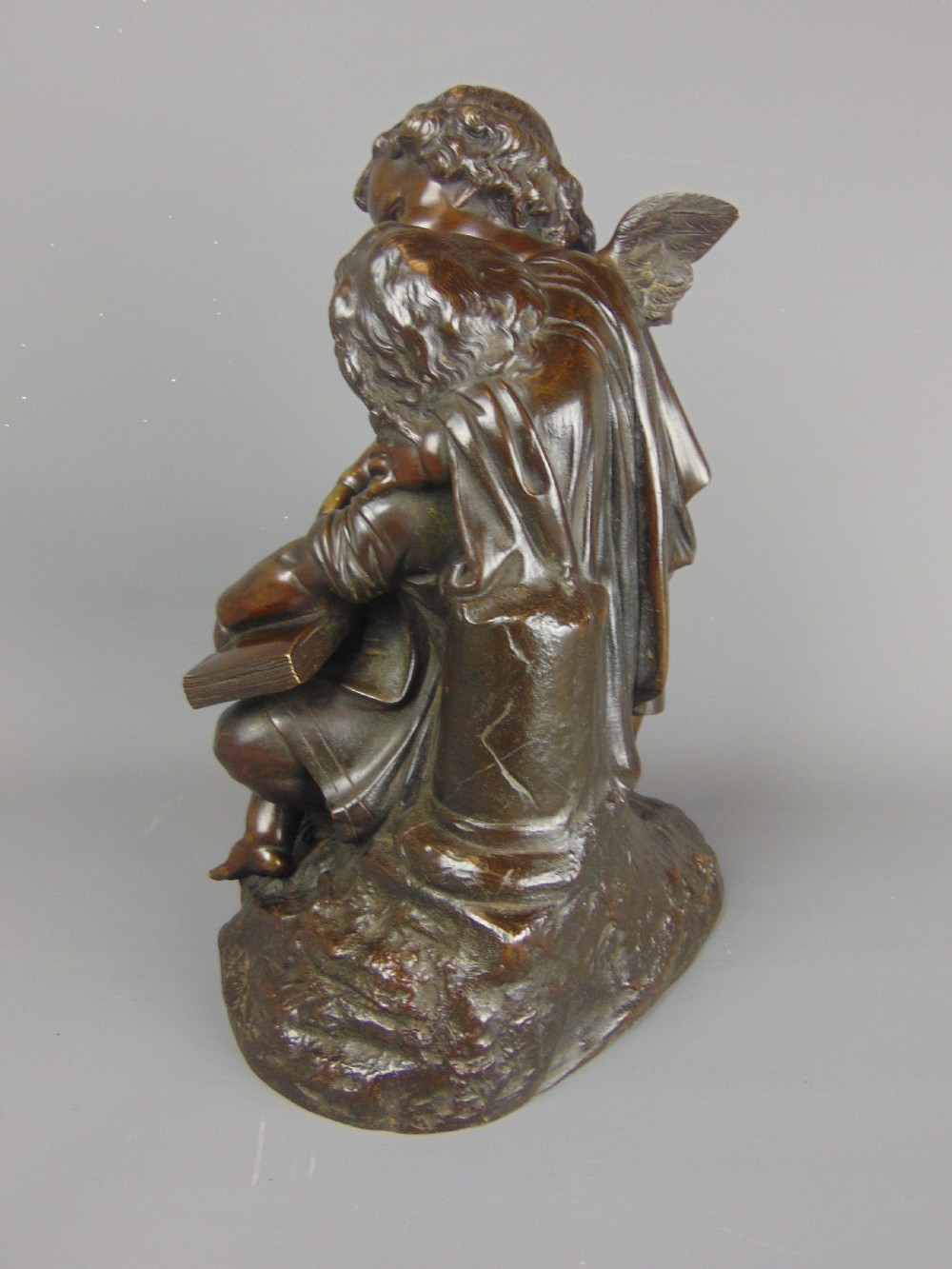 A fine Bronze of a Cherub and girl View III