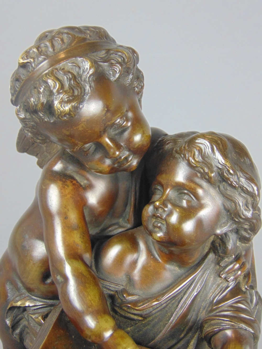 A fine Bronze of a Cherub and girl View IV
