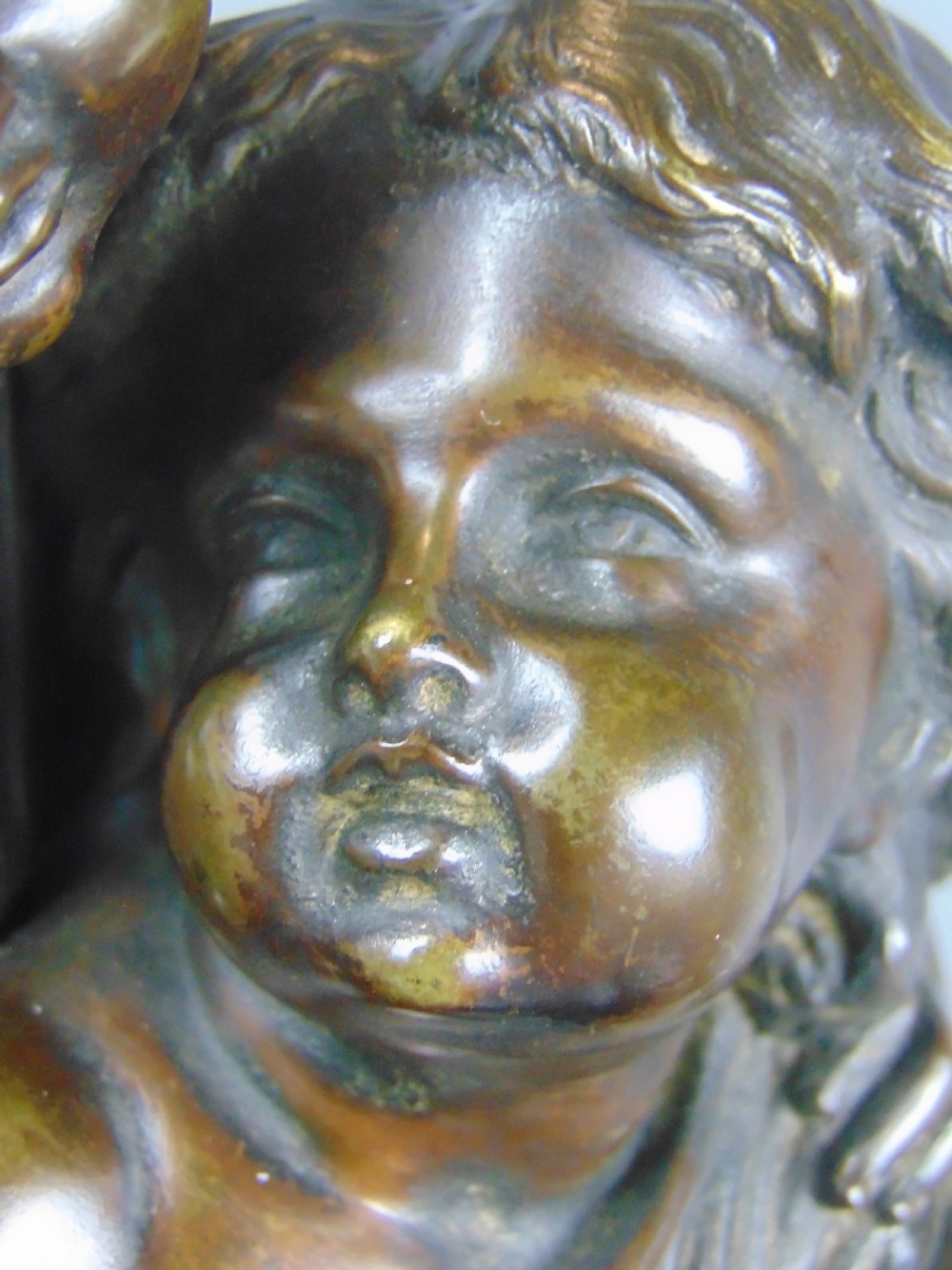 A fine Bronze of a Cherub and girl View V