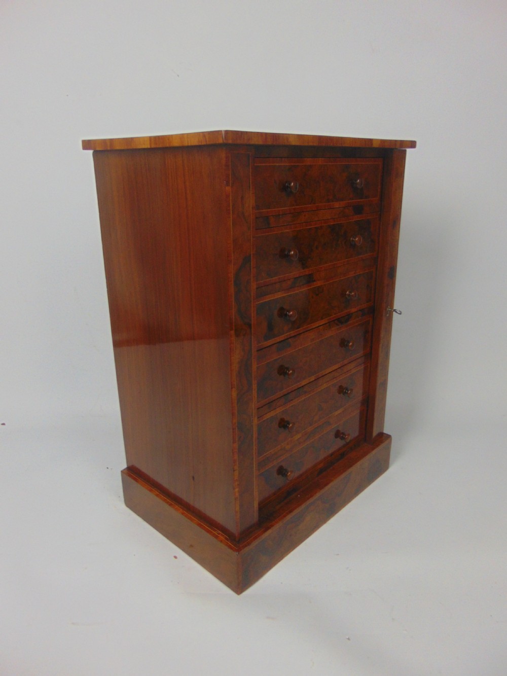 A Walnut miniature Wellington View III