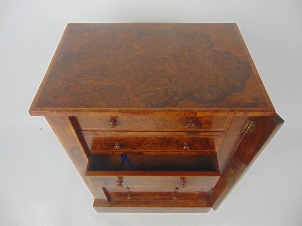 A Walnut miniature Wellington View V