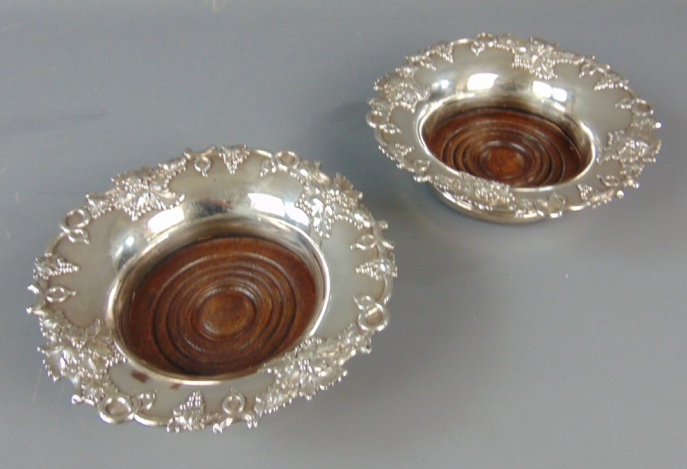 A large Pair of Antique Silver Plate bottle Coasters View II
