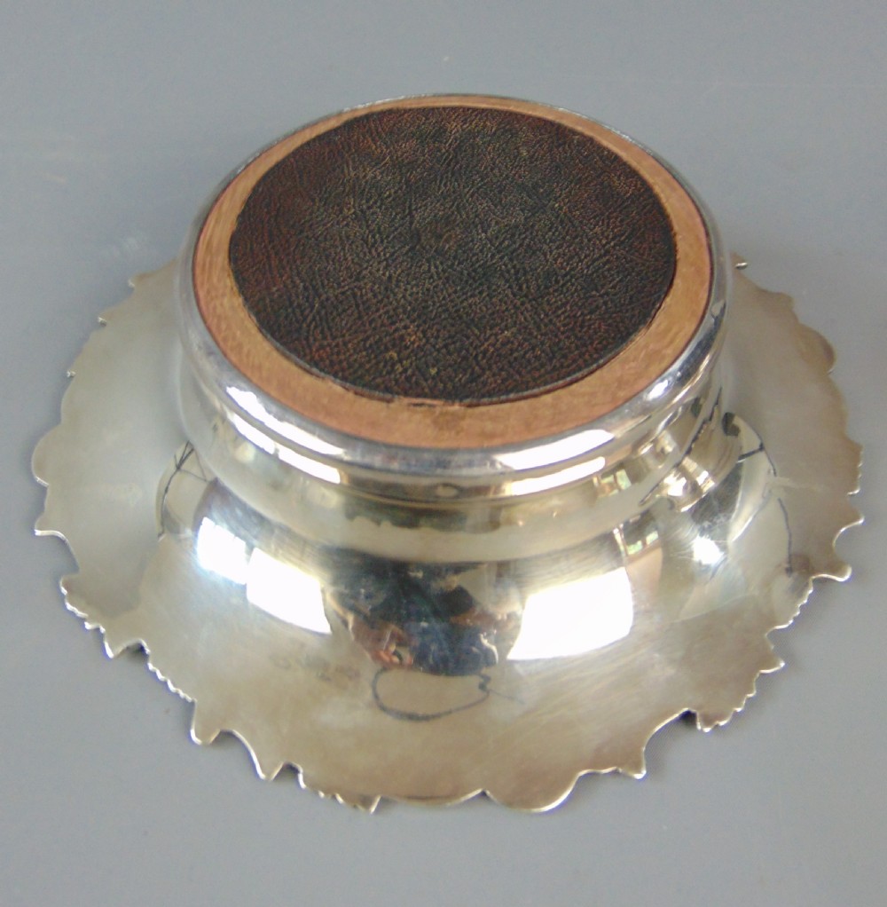 A large Pair of Antique Silver Plate bottle Coasters View VI