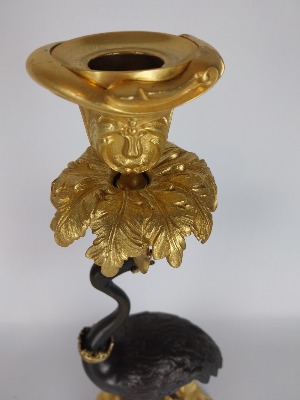 A Pair of Gilt and Bronze Stork Candlesticks  View V