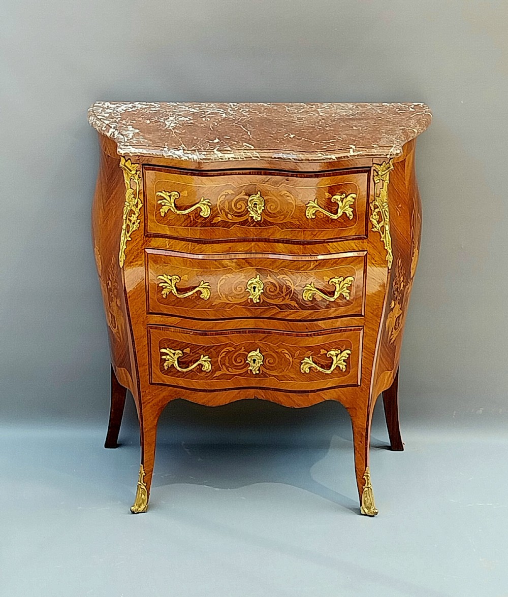 A Petite Bombe shaped French Chest of drawers 