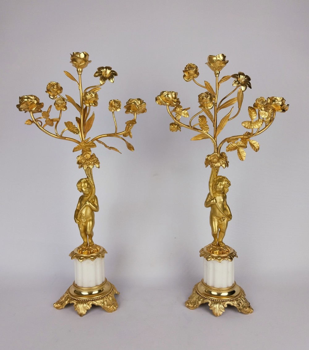 Pair of Gilt Bronze Cherub Candlesticks