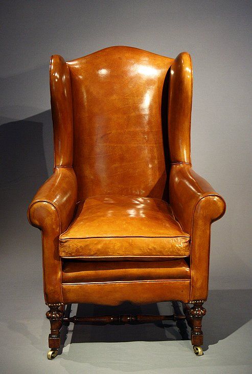 fig 3. Victorian Leather Upholstered Walnut Wing Chair