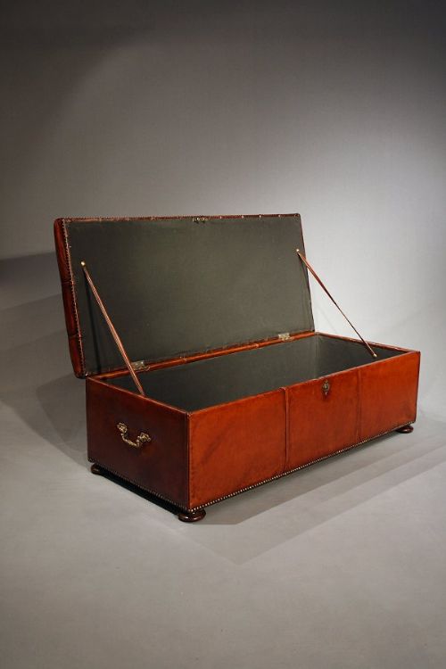 fig 5. Antique deep buttoned leather upholstered ottoman