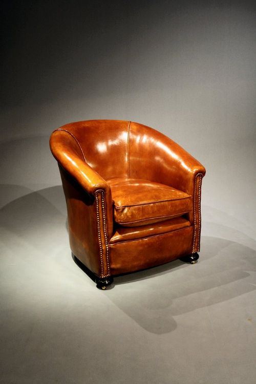 fig 8. A Stylish Pair of 1920's Leather Tub Chairs