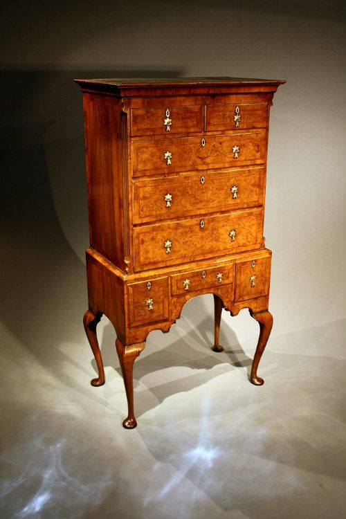 fig 1. A fine quality burr walnut chest on stand