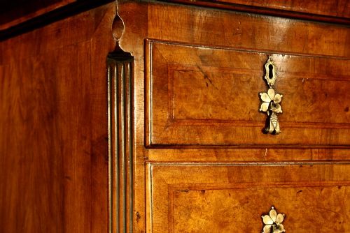 fig 4. A fine quality burr walnut chest on stand