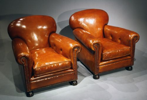 fig 3. A Pair Of Antique Leather Clubs Chairs