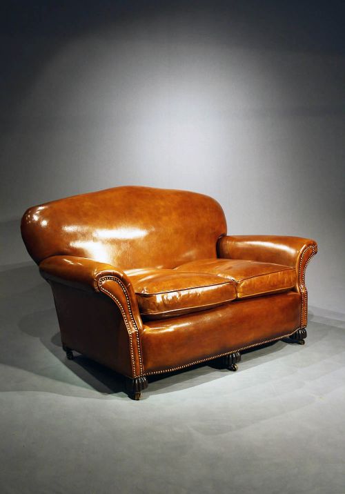 fig 1. A 1920's Leather Upholstered shaped Couch