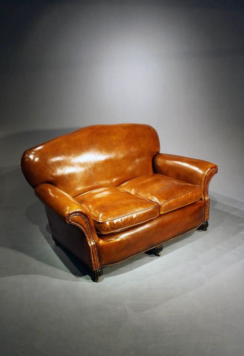fig 2. A 1920's Leather Upholstered shaped Couch