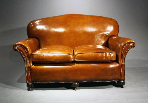 fig 4. A 1920's Leather Upholstered shaped Couch