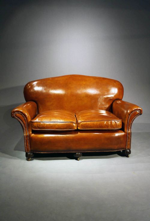 fig 5. A 1920's Leather Upholstered shaped Couch