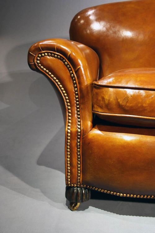 fig 7. A 1920's Leather Upholstered shaped Couch