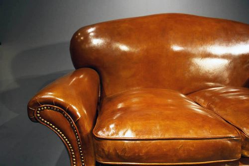 fig 8. A 1920's Leather Upholstered shaped Couch