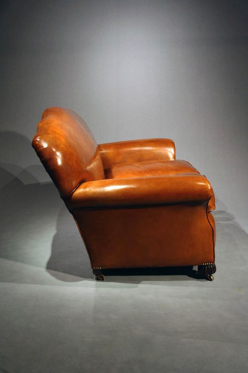fig 9. A 1920's Leather Upholstered shaped Couch