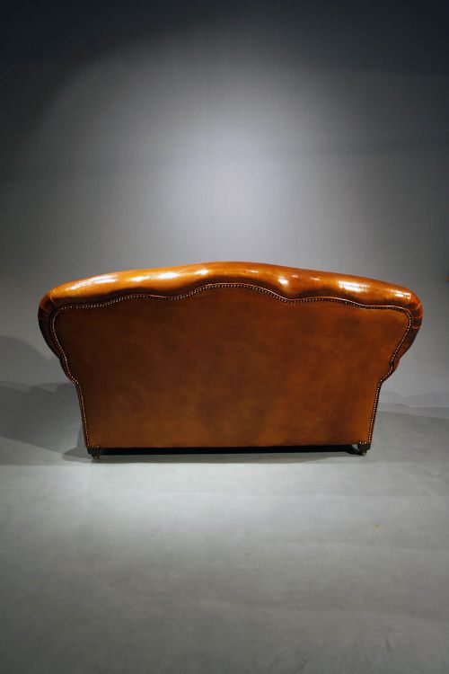 fig 10. A 1920's Leather Upholstered shaped Couch