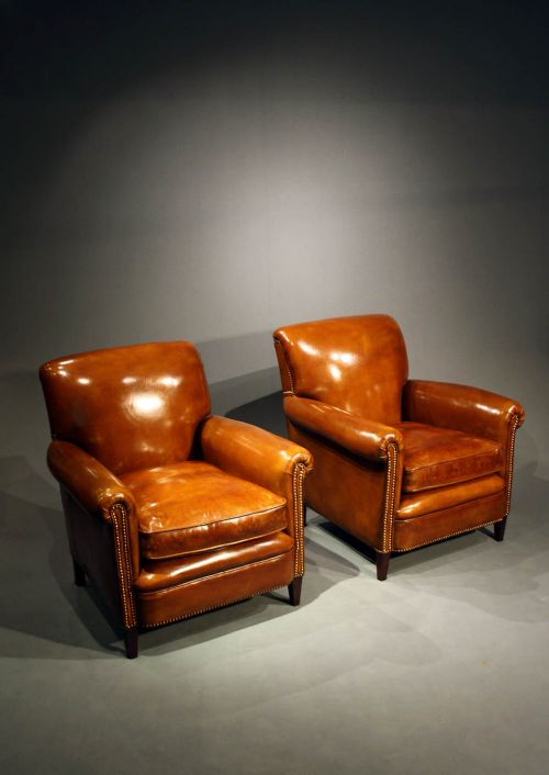 fig 3. A Pair of Leather Armchairs on Tapering Feet