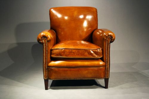 fig 5. A Pair of Leather Armchairs on Tapering Feet