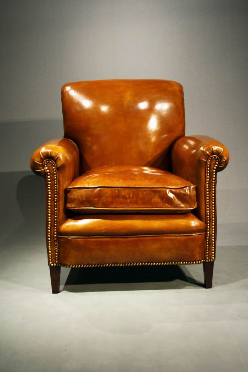 fig 6. A Pair of Leather Armchairs on Tapering Feet